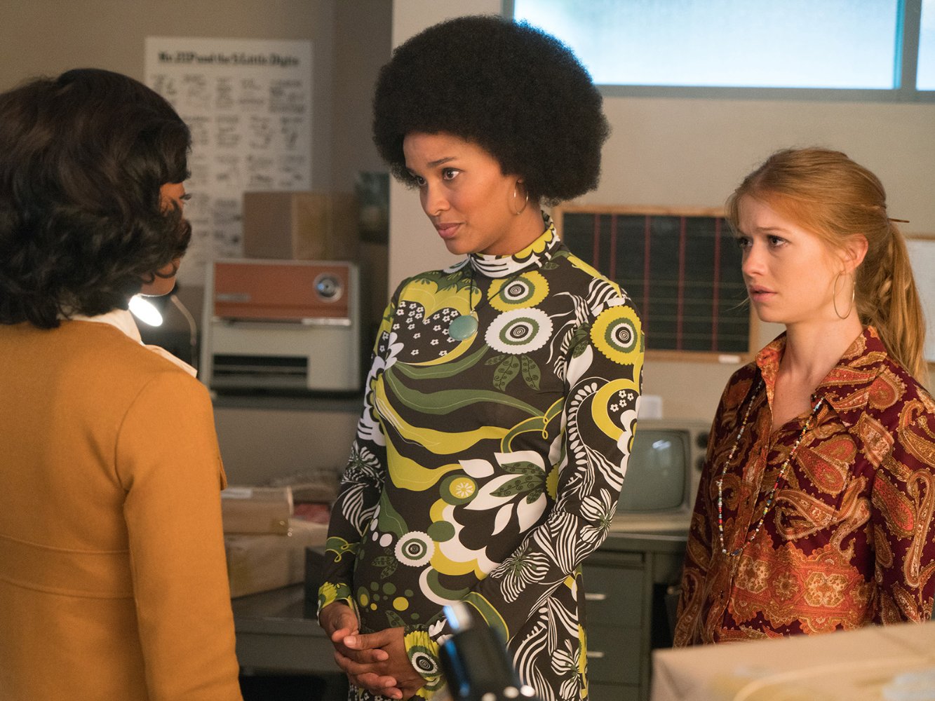 Actress Joy Bryant, center, as <a class="memberLink" title="Click to view member info in a new window" href="http://data.rollcall.com/members/98?rel=memberLink" target="_blank">Eleanor Holmes Norton</a>, meets with some of the women she's representing in their workplace equality suit. (Courtesy Amazon)