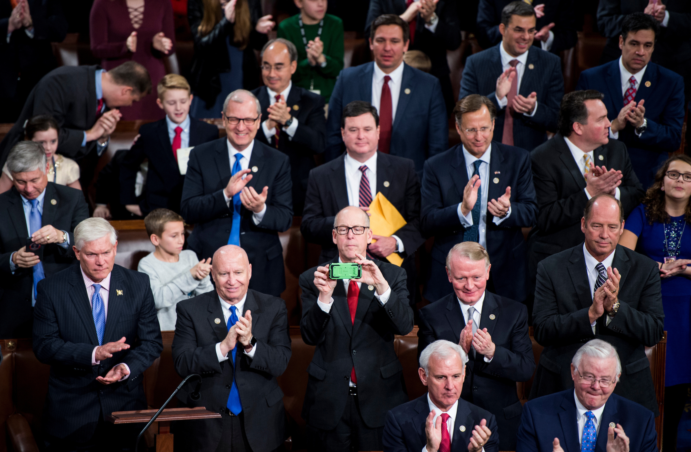 UNITED STATES - JANUARY 3: Rep. Greg Walden, R-Ore., takes photos as Speaker of the House Paul Ryan, R-Wisc., speaks on House floor onTuesday, Jan. 3, 2017. (Photo By Bill Clark/CQ Roll Call)
