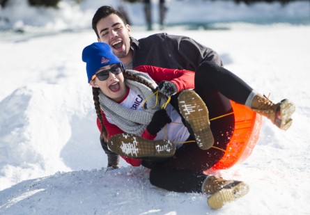 UNITED STATES - JANUARY 25: American University students Dana Foley and Bryan White sled down the hill on the West Front of the U.S. Capitol on Monday, jan. 25, 2016, after the weekend's major snowstorm dumped nearly two feet of snow in Washington over the weekend. (Photo By Bill Clark/CQ Roll Call)
