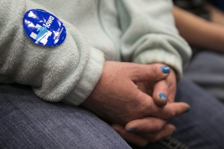 UNITED STATES - JANUARY 20 - A woman holds her hands as she listens to Democratic presidential candidate Hillary Clinton speak during an organizing event, Wednesday, Jan. 20, 2016, in Burlington, Iowa. (Photo By Al Drago/CQ Roll Call)