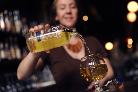 Mary Kate Wrzesniewski, general manager at Boundary Road on H Street NE, pours a honey wine made by Charm City Meadworks,