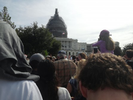 Those gathered on the West Front collectively prayed that the zoom function on their smartphones would be mighty enough to capture Pope Francis’ appearance on the Speaker’s Balcony. (Warren Rojas/CQ Roll Call)