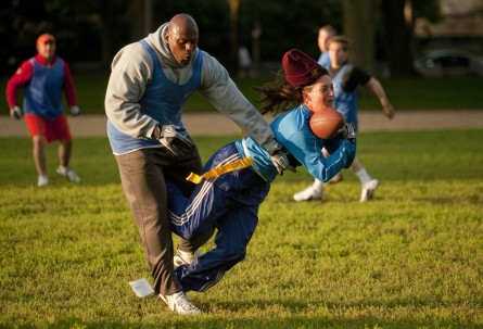 Former Redskin Ken Harvey takes out Donna Wilkinson of the women's football team DC Divas, during a congressional football practice on the Mall in preparation for the upcoming game between members of Congress and the Capitol Police. (Tom Williams/CQ Roll Call File Photo)