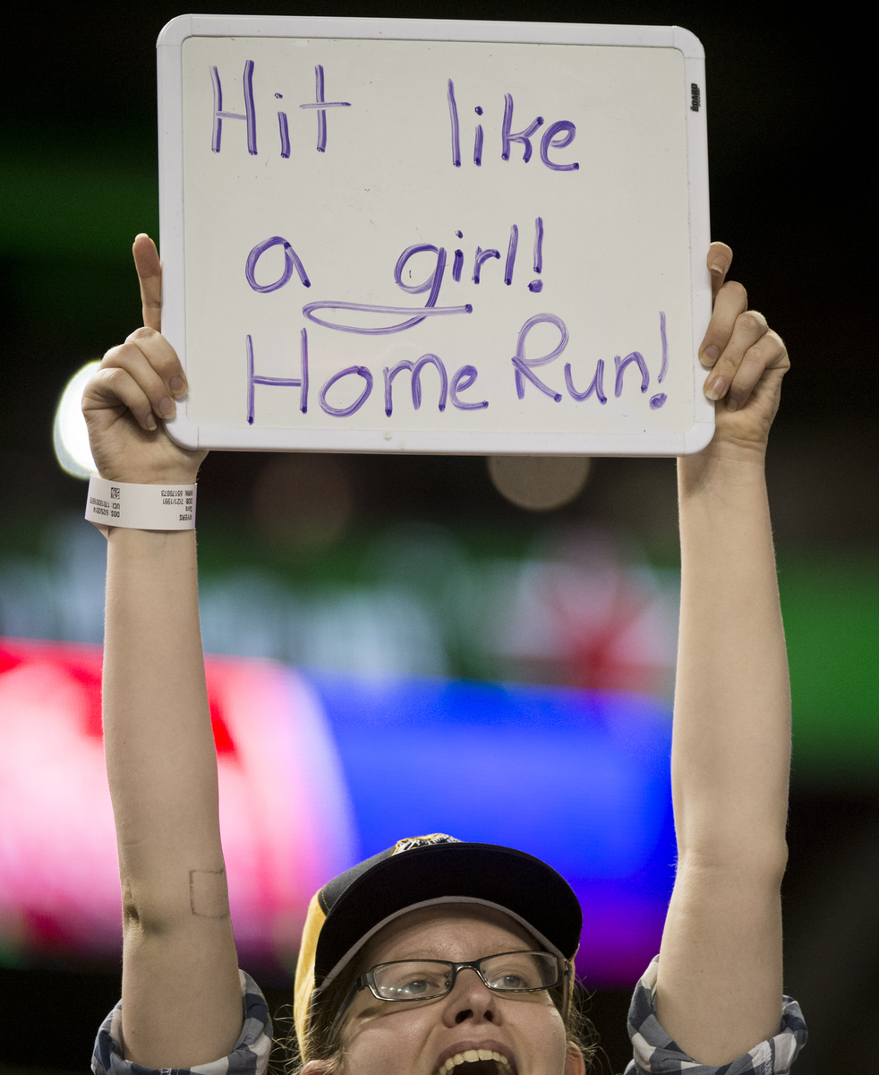 UNITED STATES - JUNE 25: A fan of Rep. Linda Sanchez, D-Calif., cheers as Sanchez bats during the Roll Call Congressional Baseball Game on Wednesday, June 25, 2014. (Photo By Bill Clark/CQ Roll Call File Photo)