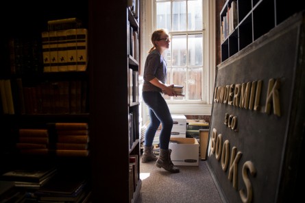 Grisham helps prepare for the reopening. (Tom Williams/CQ Roll Call)