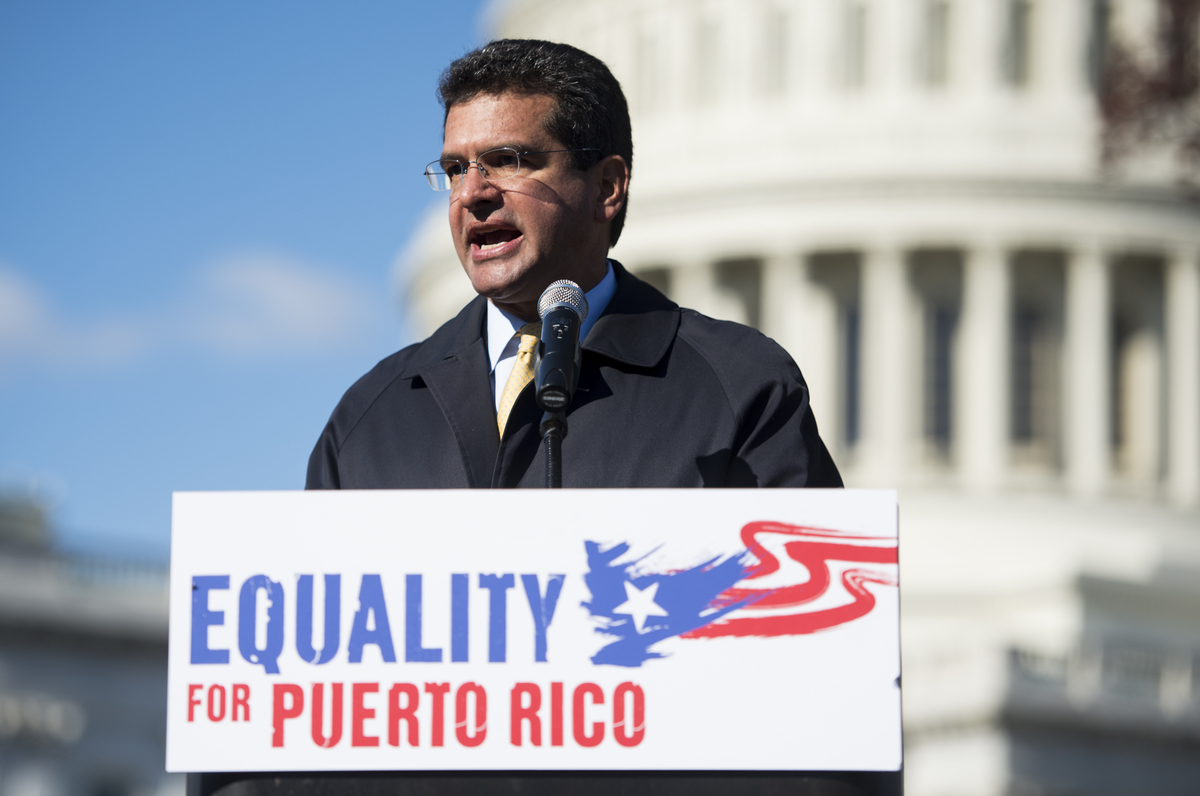 UNITED STATES - NOVEMBER 19: Del. Pedro Pierluisi, D-PR, speaks during the rally in support of Puerto Rico statehood on the east side of the U.S. Capitol on Tuesday, Nov. 19, 2013. (Photo By Bill Clark/CQ Roll Call)