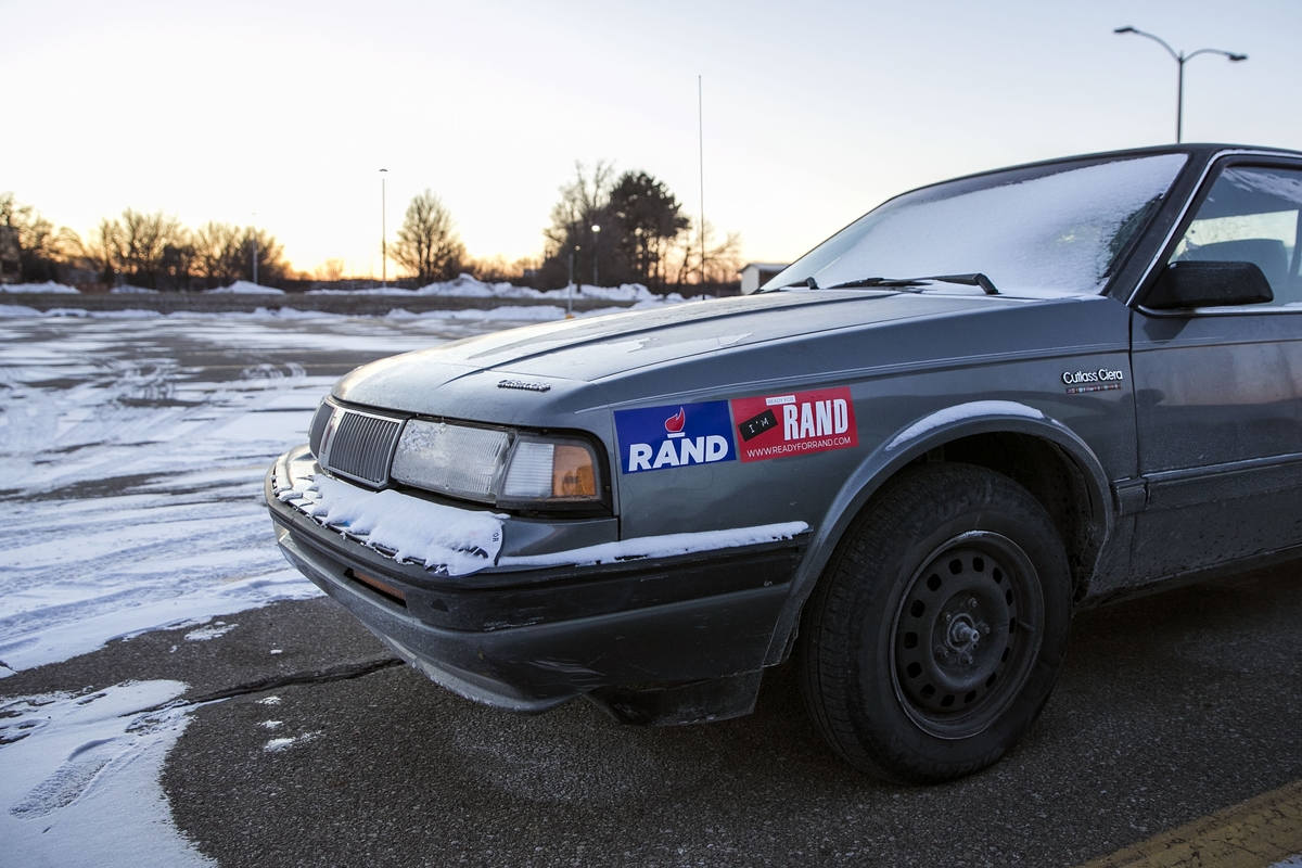 Campaign stickers are seen on a car in the parking lot at the state campaign headquarters of Paul, R-Ky., in Des Moines, Iowa, on Sunday, Jan 17, 2016. (Al Drago/CQ Roll Call File Photo)