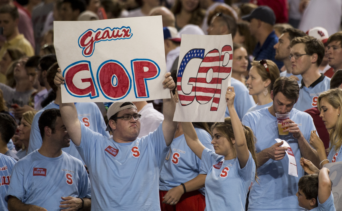 Staffer fans cheer for their preferred party at the Roll Call Congressional Baseball Game. (Bill Clark/CQ Roll Call File Photo)