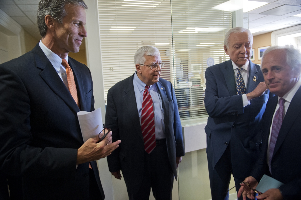 UNITED STATES - JUNE 24: From left, Sens. John Thune, R-S.D., Mike Enzi, R-Wyo., Orrin Hatch, R-Utah, and Bob Corker, R-Tenn., prepare for a news conference to discuss bills passed in the Senate during the first six months of Republican leadership, June 24, 2015. (Photo By Tom Williams/CQ Roll Call)