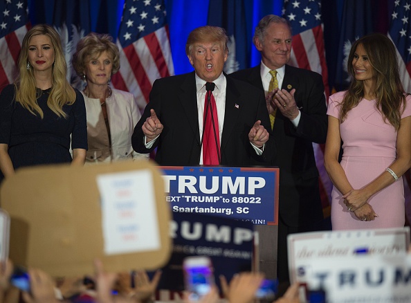 Republican presidential candidate Donald Trump celebrates winning the South Carolina primary in Spartanburg, South Carolina, February 20, 2016. Republican presidential frontrunner Donald Trump grabbed a big win in the South Carolina primary on February 20, 2016. The 69-year-old Trump captured about a third of the votes, according to early counts, but all major networks projected he was the winner. / AFP / JIM WATSON (Photo credit should read JIM WATSON/AFP/Getty Images)