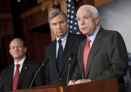 Lawmakers, such as, from right, Sens. John McCain, Sheldon Whitehouse and Chris Coons, who here are discussing a trip to Syria, Afghanistan and Egypt in 2013, travel for a variety of reasons abroad. (Chris Maddaloni/CQ Roll Call File Photo)