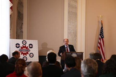 Coons speaks on American competitiveness (Photo courtesy of Coons' office).