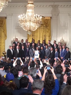 President Barack Obama holds up the No. 44 jersey presented to him by the NBA champion Golden State Warriors on Thursday at the White House.