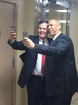 Booker and Daines "snapchatted" in the Senate basement. (Bridget Bowman/CQ Roll Call)