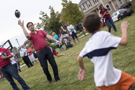 Rubio threw a football around during a recent trip to Iowa. (Al Drago/CQ Roll Call)